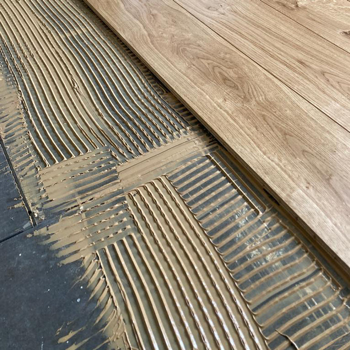 divslāņu dēļu ieklāšana pielīmēšana uz gruntētas dubultā grīdas reģipša, elastīga kvalitatīva Kiilsto MSSilex līme